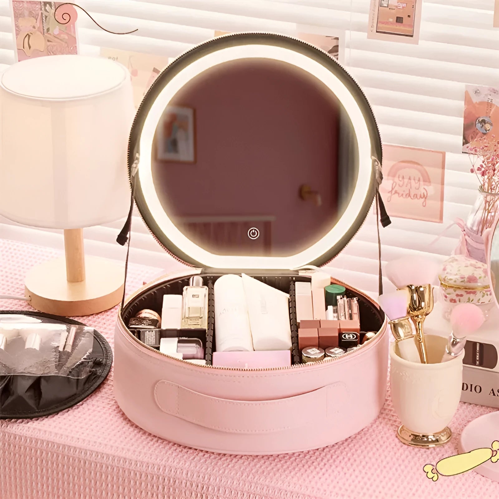 Round Cherry Blossom Pink LED makeup bag with mirror open, showing internal compartments and adjustable lights.
