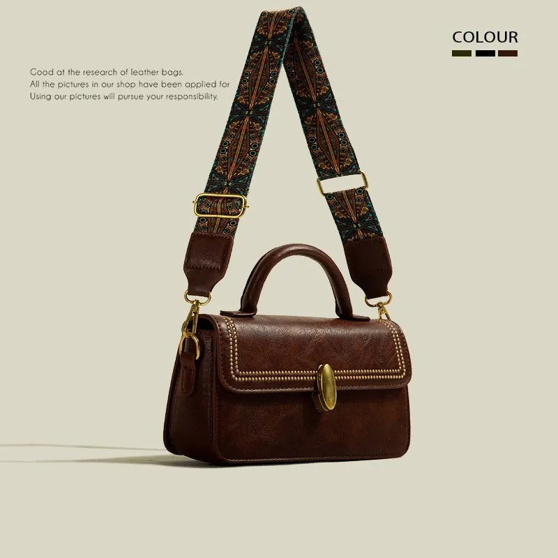 Brown retro-textured women's messenger bag with a shoulder strap, showing internal phone and file pockets.