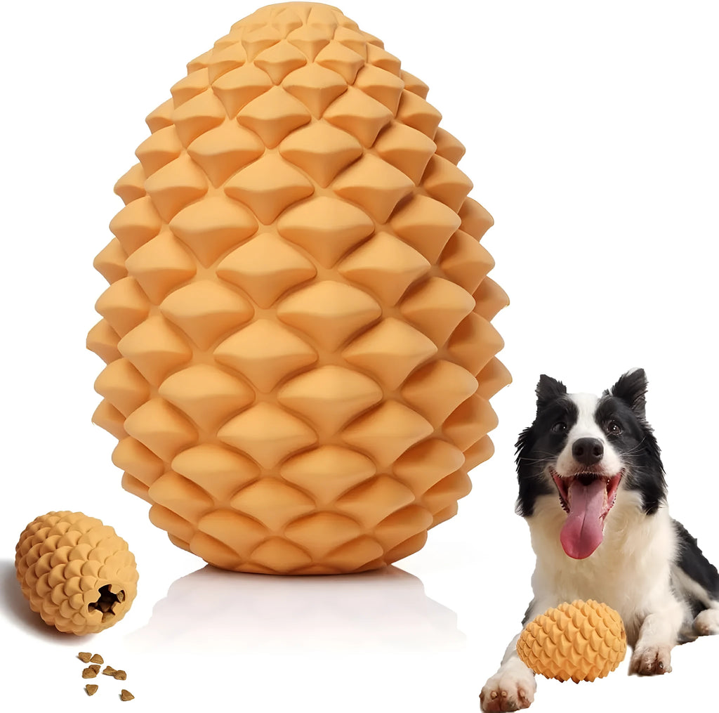 Yellow pine cone-shaped natural rubber dog chew toy with treat dispenser hole.