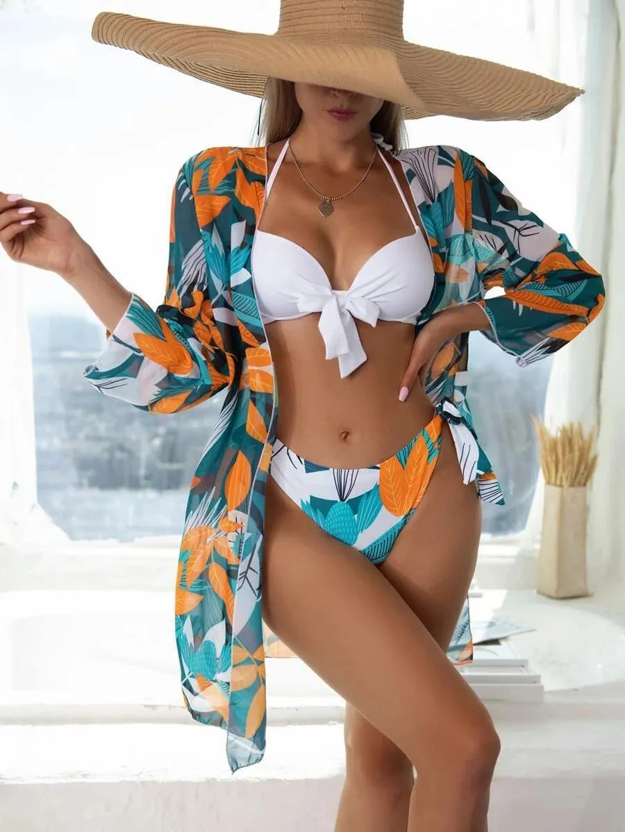 Women's three-piece bikini swimsuit set with mesh cover-up coat in various prints.