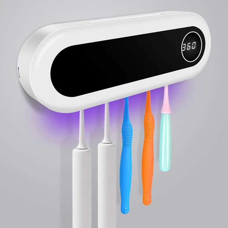 Ivory White wall mounted UV toothbrush steriliser holder with digital display and toothpaste squeezer.