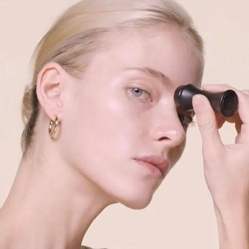 Volcanic stone facial roller for oily skin control in black, green, pink, or white.
