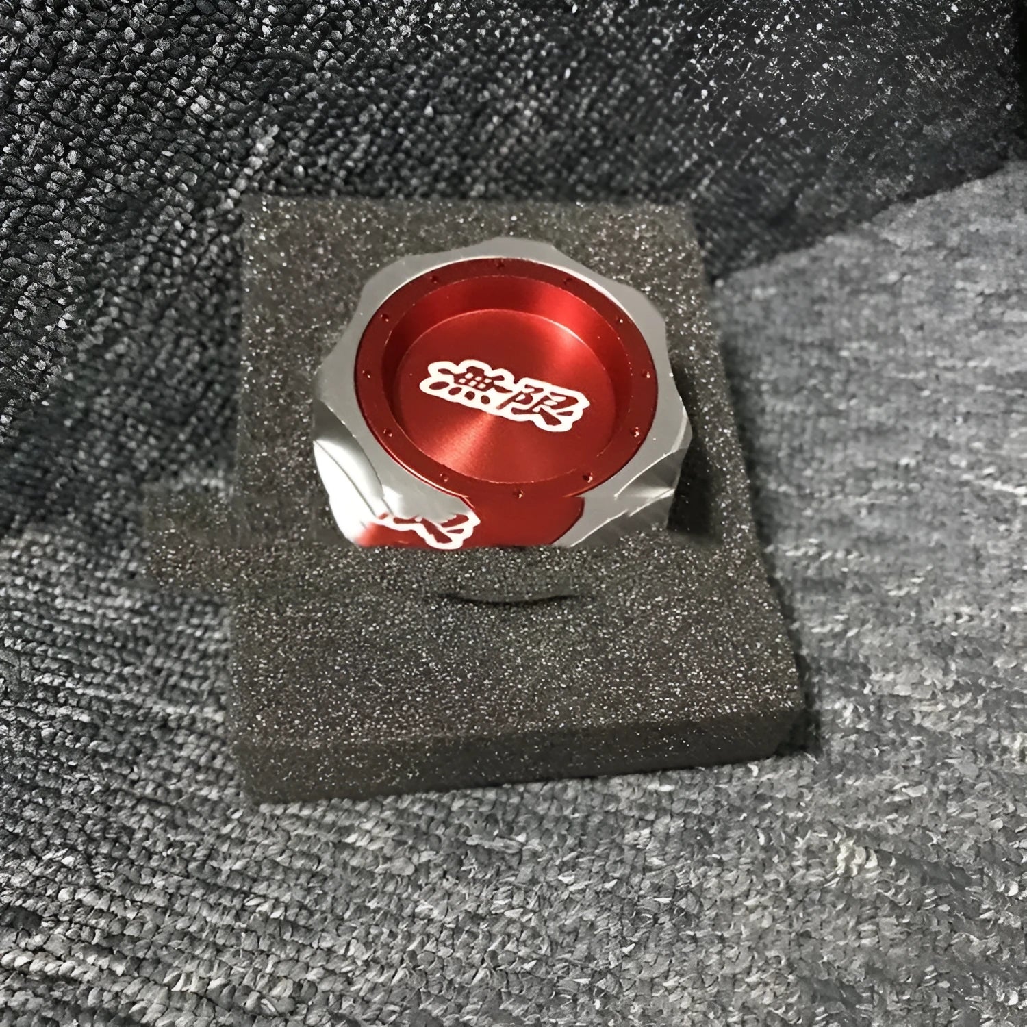 Aluminium alloy oil filter cap for Honda vehicles in assorted colours on a dark background.