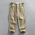 Men's straight-leg cotton work trousers in apricot, brown, and army green colours