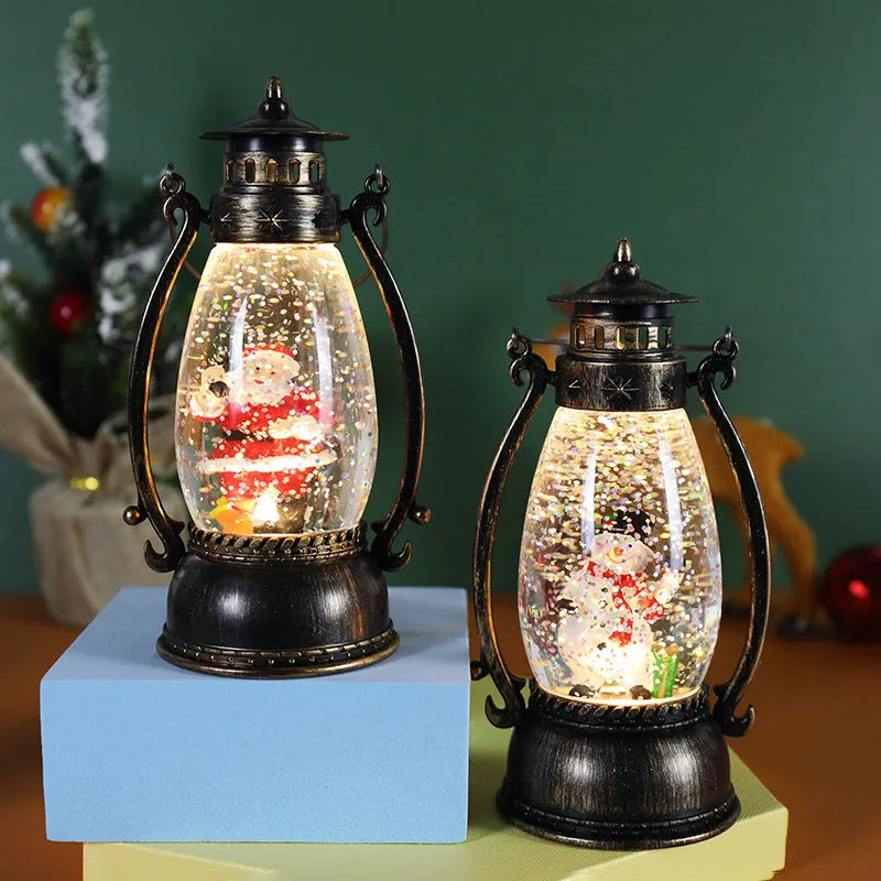 Plastic oil lamp snow globe ornament lit up with snowman figurine on a desktop.