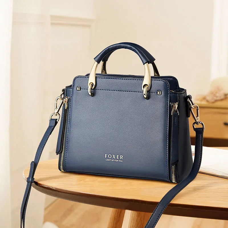 FOXER small handbag colour contrast design black blue red white positive trapezoid shape