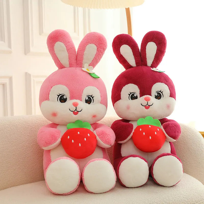 Pink strawberry rabbit plush toy doll pillow with soft furry fabric on white background
