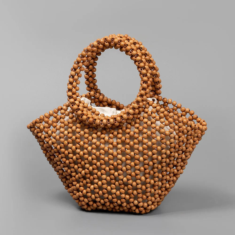 Hand-woven maple hollow handbag with wooden bead decoration, dumpling-shaped 13x7x18cm beach bag