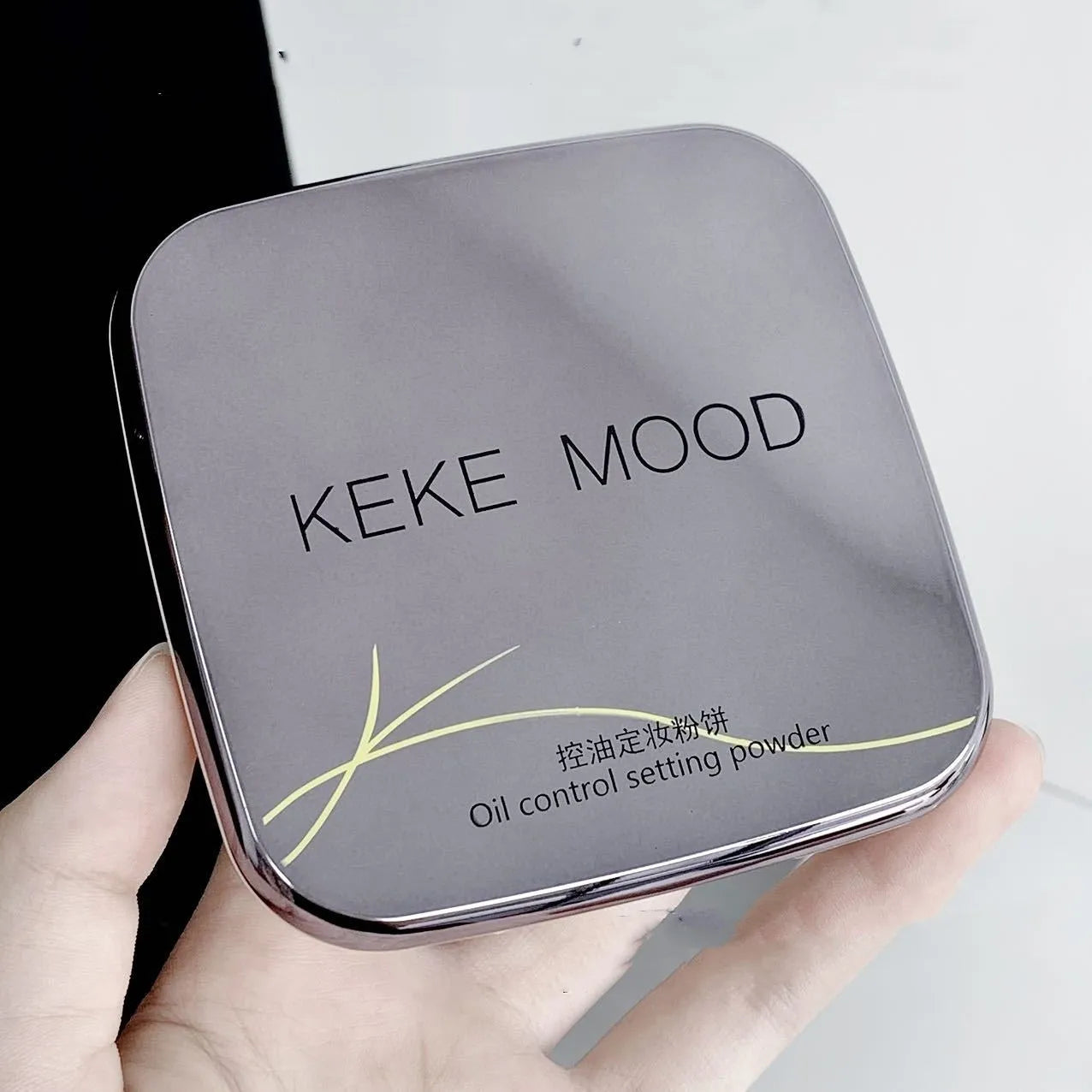 Open compact of oil control pressed powder showing a matte powder surface, with 15g net content and shade options listed.