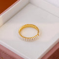 Gold geometric open mouth women's ring with round elements and electroplated copper construction