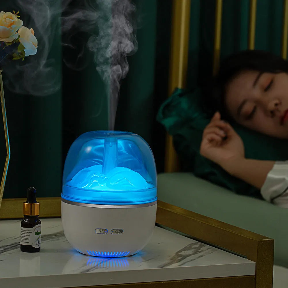 Green ultrasonic aromatherapy humidifier with heavy fog and colourful gradient light on a desk