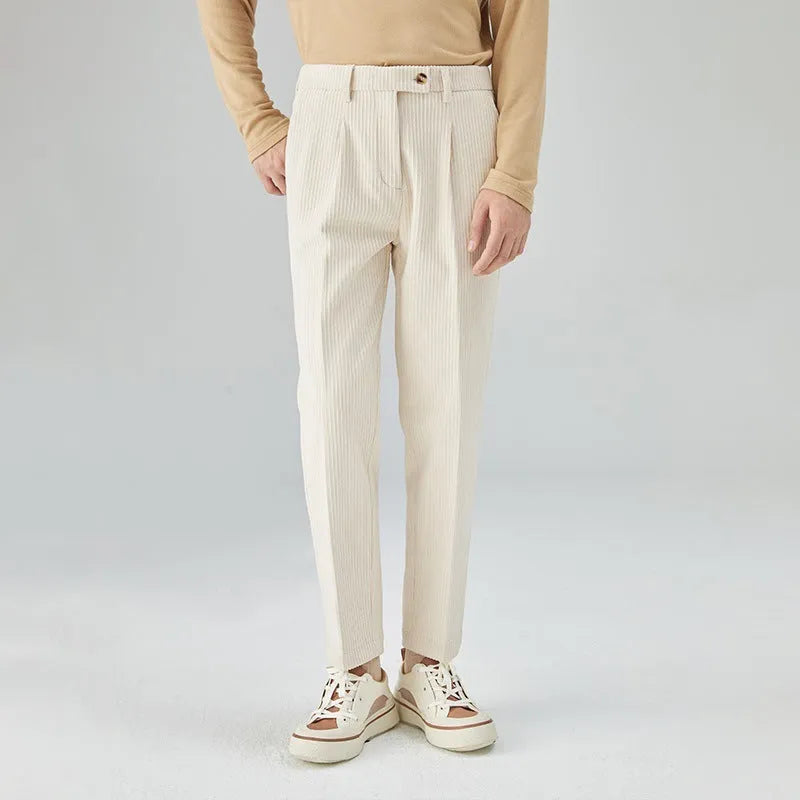 Men's straight-leg corduroy trousers in beige colour showing micro elastic waistband and loose fit design