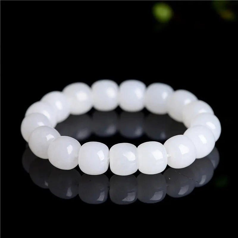 White Hetian jade barrel bead bracelet for men and women shown in three bead size options.