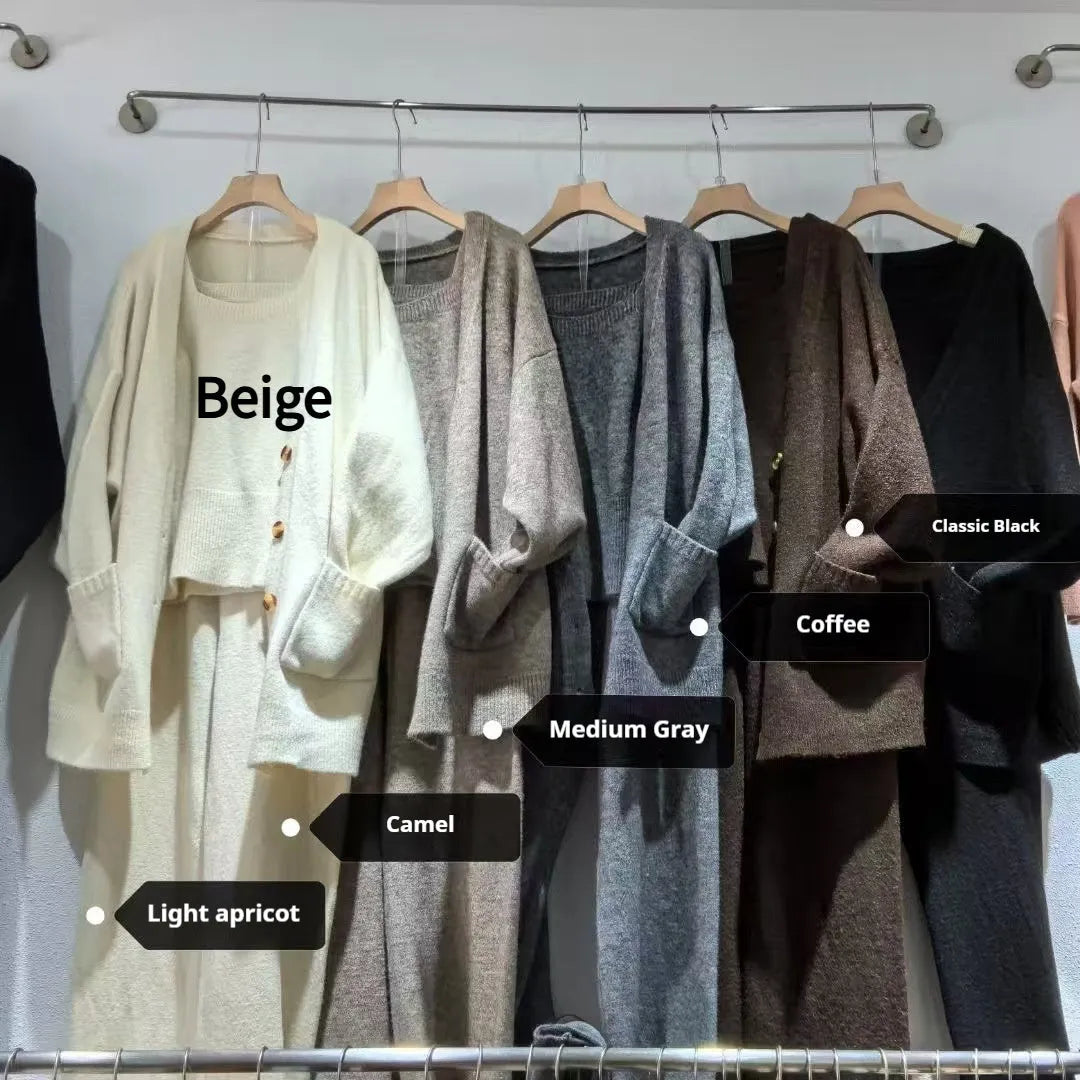 Women's light brown wool blend knit cardigan, vest, and trousers three-piece set laid flat.