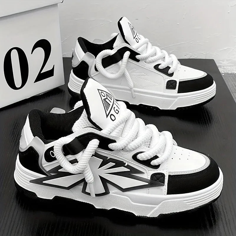 Men's white chunky sneakers with thick rubber sole and synthetic leather upper on a casual background.