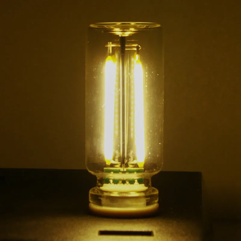 RX9001 transparent glass USB touch night lamp showing compact 22x64mm dimensions
