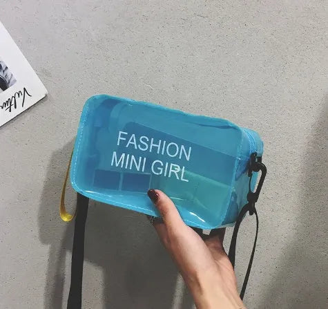 Transparent square jelly shoulder bag in PC material with an adjustable strap, shown in a light colour.