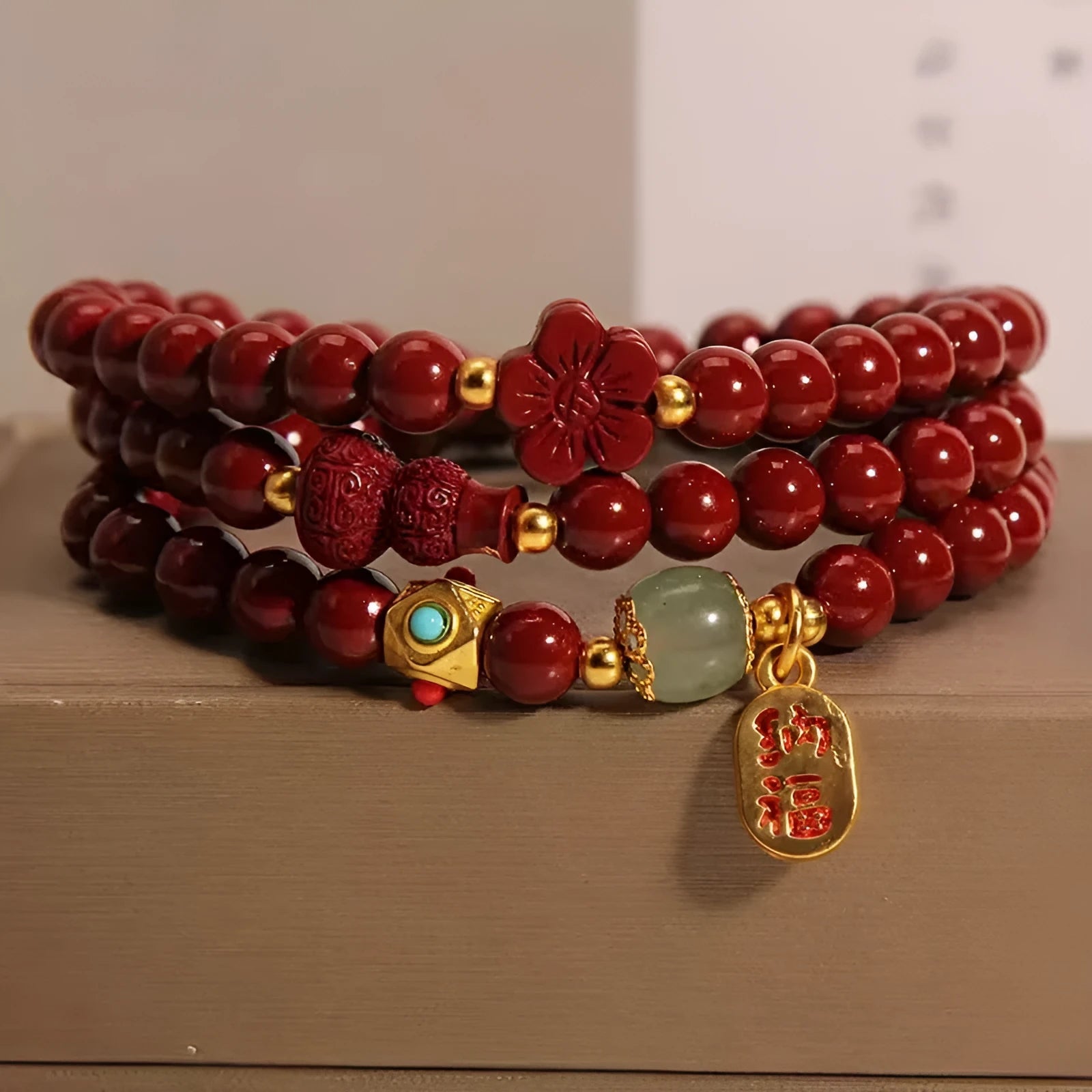 Women's multi-circle cinnabar bracelet with gourd and five petal flower design
