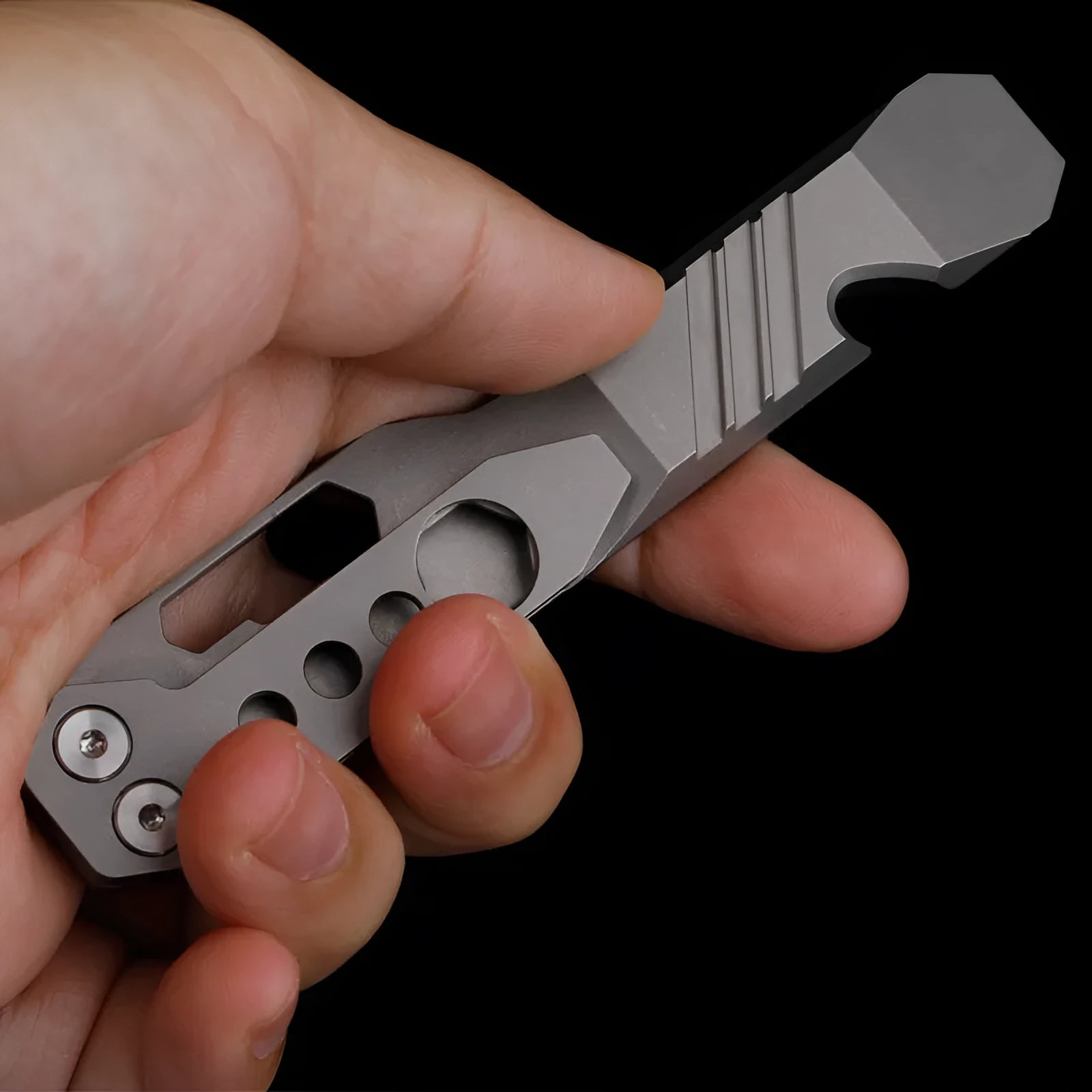 Titanium alloy multi-function crowbar tool with screwdriver and bottle opener in stone wash or gun grey finish