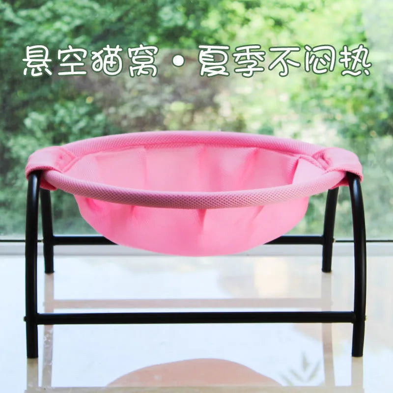 Free-standing cat hammock bed with breathable mesh fabric, detachable washable nest, and four iron legs.