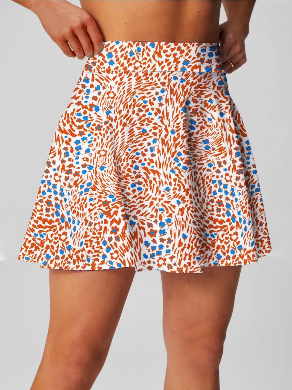 Women's blue high waist sports skirt for tennis and golf on a white background