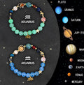 A pair of natural stone beaded bracelets featuring a zodiac sign design, shown together as a matching set.