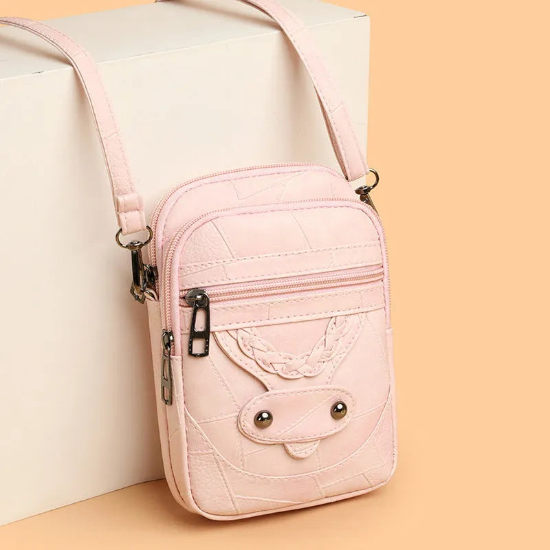Retro style mobile phone bag in soft PU leather with weaving patterns and rivet detailing in four colour options