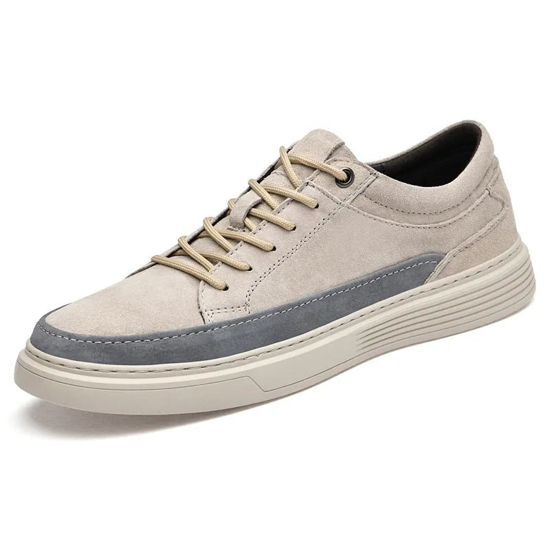 Men's grey and sand casual leather skate shoes with a round toe and rubber sole.