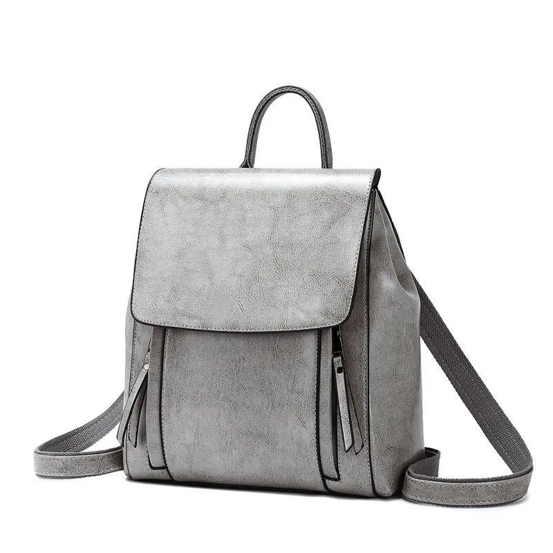 Genuine leather ladies backpack, large square vertical shape, black, with zipper pockets and double straps