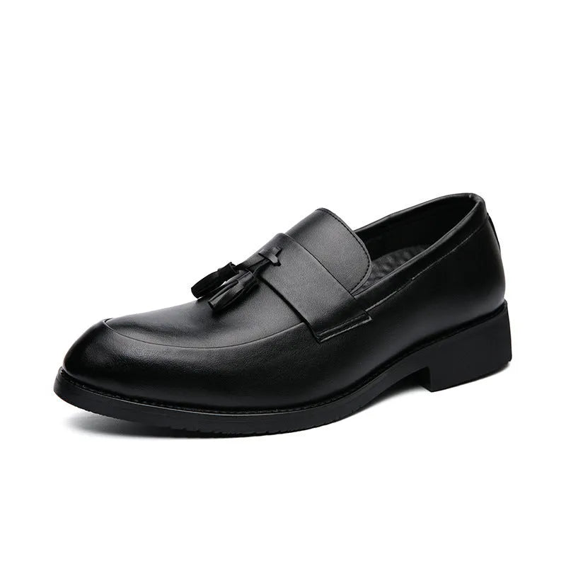 Men's black slip-on loafers with a tassel decoration on a pointed-toe, low-top artificial PU upper.
