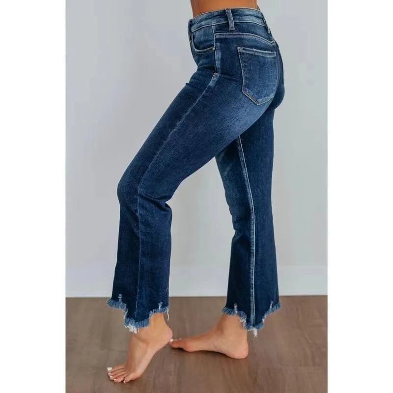 Women's solid colour denim pants with a hand-worn finish in dark blue and light blue.