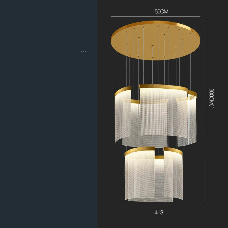 Large gold mesh disc chandelier with multiple pendant heads against a light ceiling
