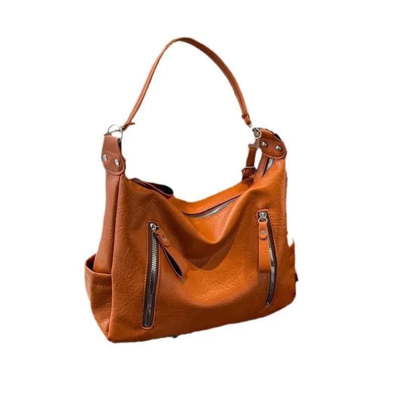 Retro PU shoulder commuter tote bag in black with horizontal square shape, sandwich zip pocket, and sandwich pocket