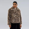 Women's leopard print coat with a buckle lapel closure on a hanger.