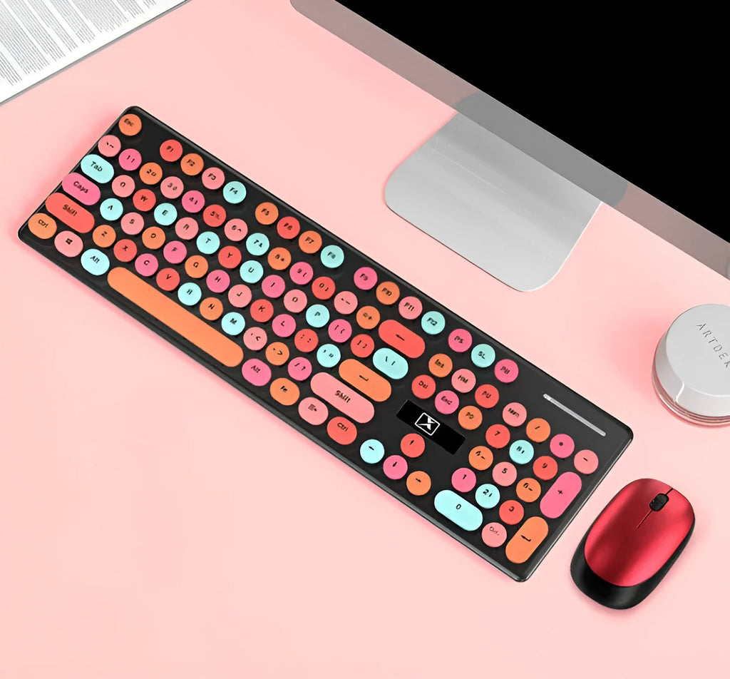 Vibrant yellow Wireless Punk Manipulator keyboard and mouse set on a desk, showing backlit keys.