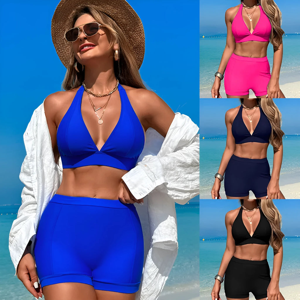 Women's black bikini swimsuit laid flat, showing sleeveless design and split bottom.