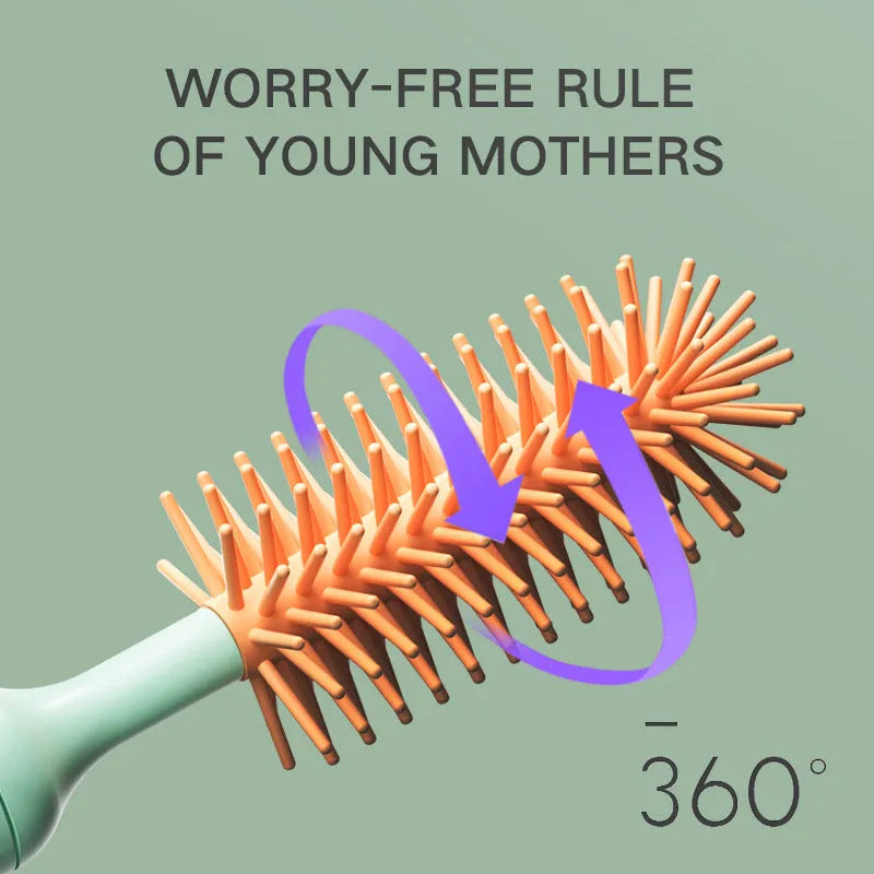 Pink and green electric rotating bottle cleaning brush with silicone bristles on a white background.