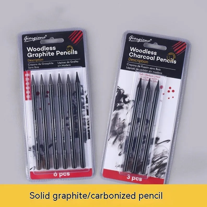 Set of nine drawing pencils with wooden shells, comprising six graphite and three carbonised pencils, on a suction card.