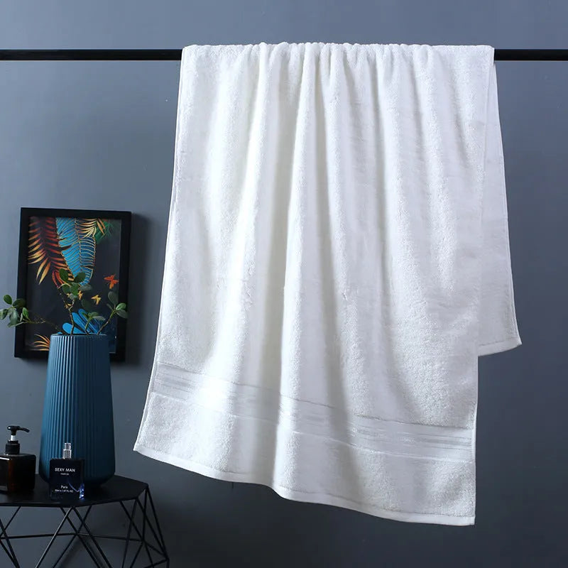 Pure cotton bath towel set showing three pieces in blue colour with floral pattern detail