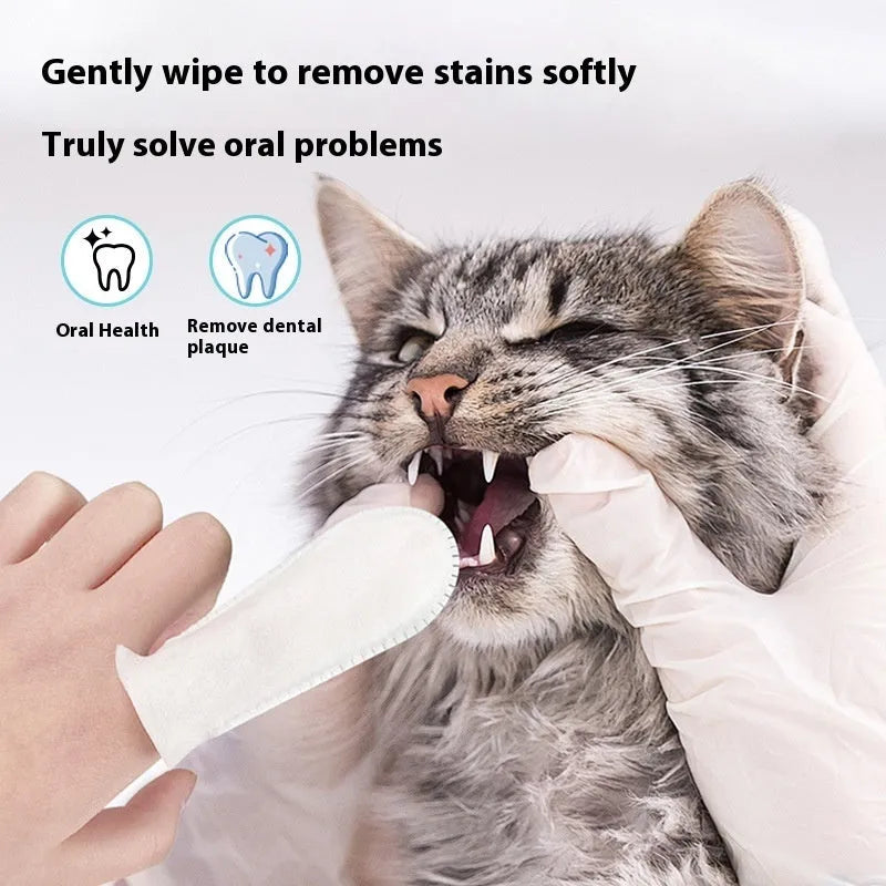 Open pack showing multiple beige non-woven fabric pet dental cleaning finger stalls or cots for cats and dogs.