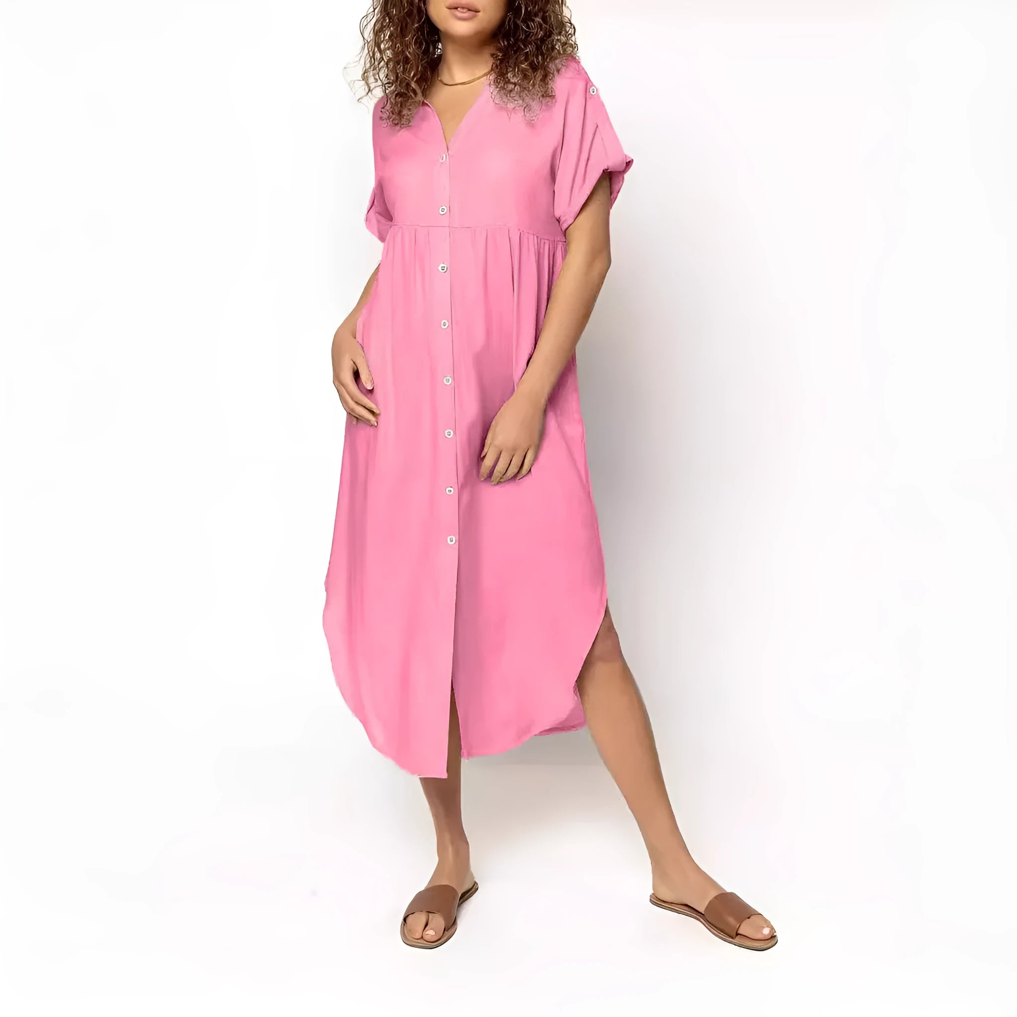 Loose fit casual midi dress with button front in solid colour on a model