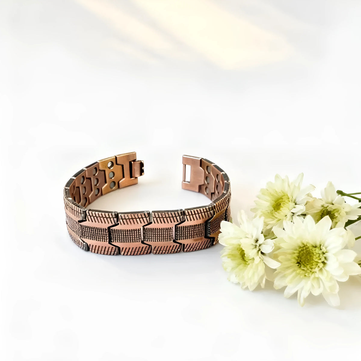 Retro bronze three-row magnetic bracelet with geometric links, zinc alloy electroplated finish and regulator