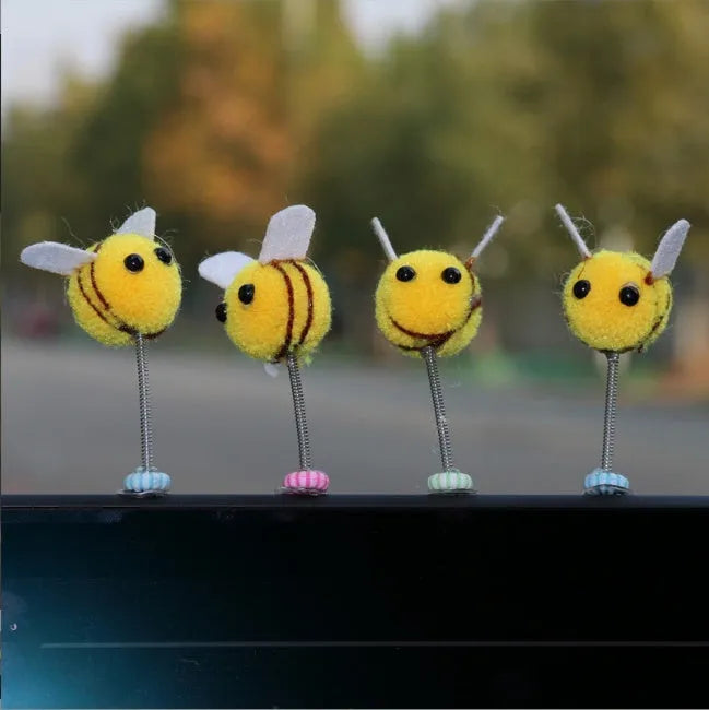 Small fur ball bee car decoration measuring 3cm square with cartoon design