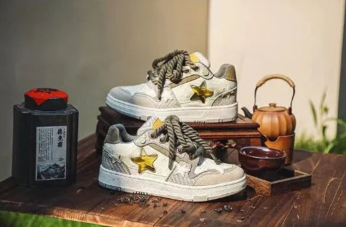 Green Small Crowd Original low-top sneakers with star pattern stitching and thick rubber sole on a white background.