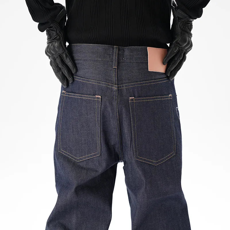 Dark blue loose straight-leg casual jeans on a neutral background.