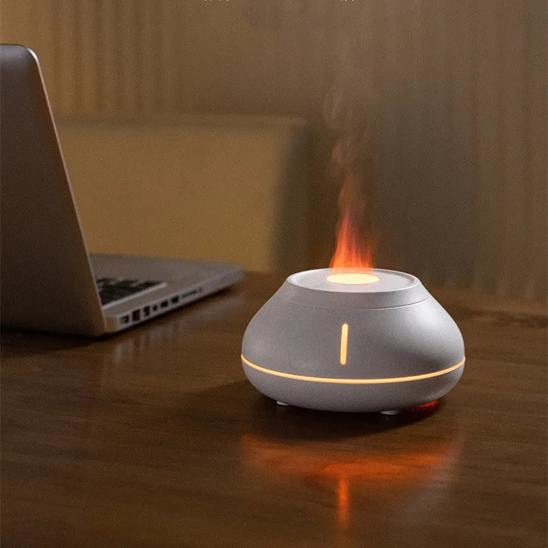 Round desktop humidifier with colourful flame simulation effect and USB power connection