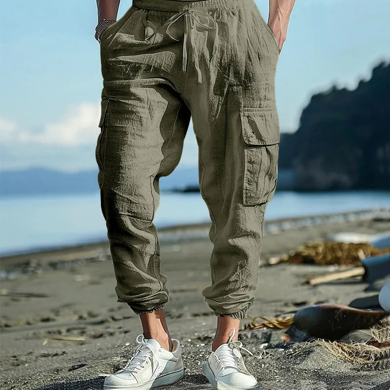 Men's loose-fit linen casual trousers with ankle ties and multiple pockets in Army Green.