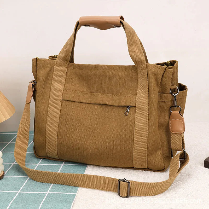 Canvas tote bag with multiple compartments in Army Green colour showing internal organisers