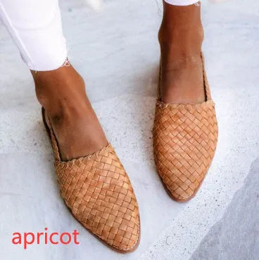 Women's flat sandals with a buckle and pointed toe in multiple colour options.