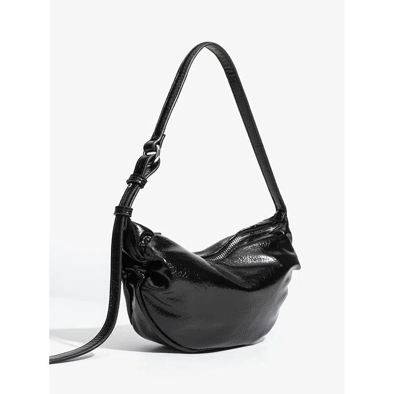Black pleated shoulder bag in soft PU with rock-and-roll style and three-dimensional outer pocket
